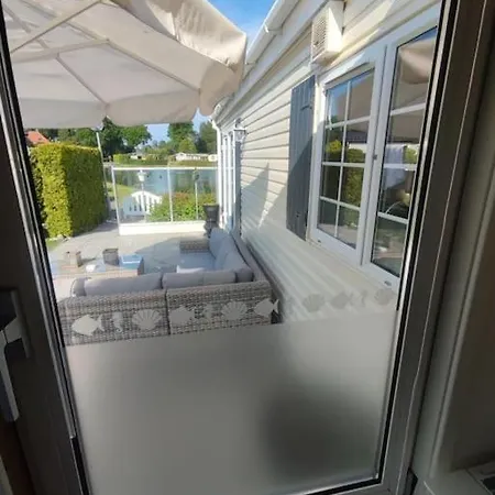 Zonnig Chalet Aan Mooie Visvijver Voorthuizen